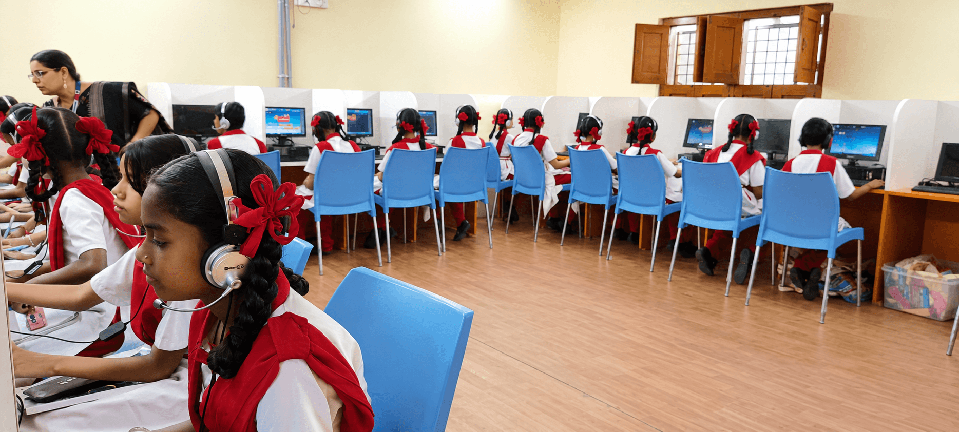 Students working in the Little Flower English High School computer lab